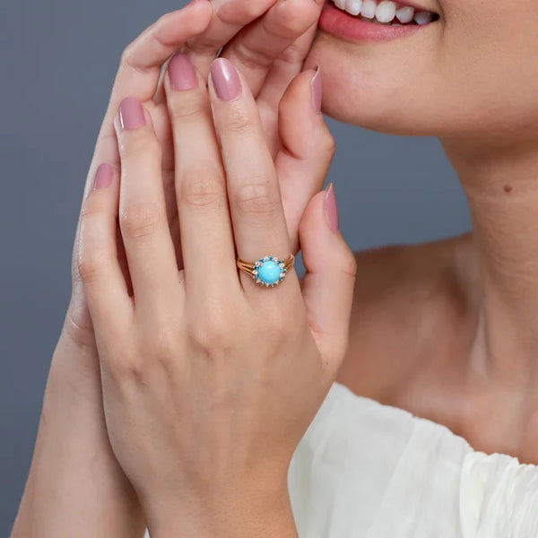 Round turquoise triple split shank ring in 18k yellow gold with alternating diamond halo by Irdoja Diamonds.