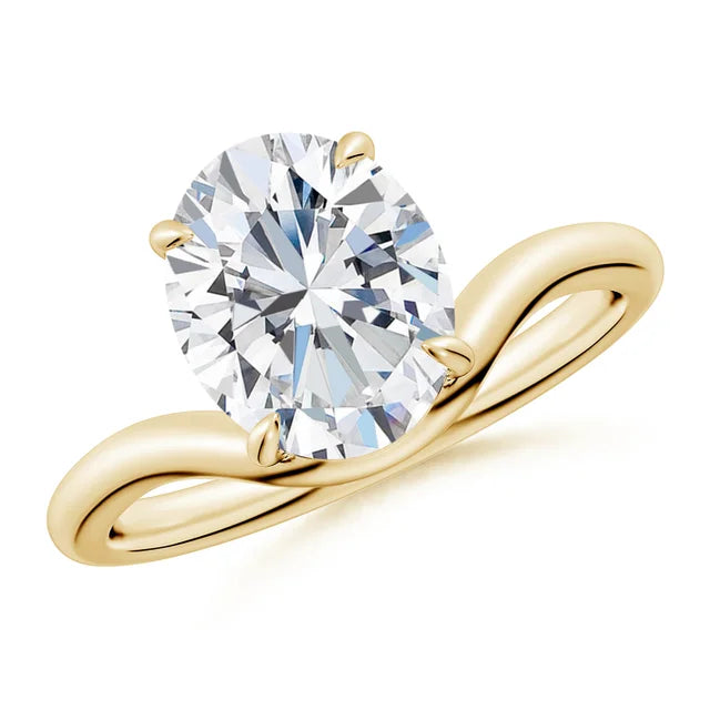 Solitaire oval lab-grown diamond engagement ring with curved shank in 18K yellow gold by Irdoja Diamonds.